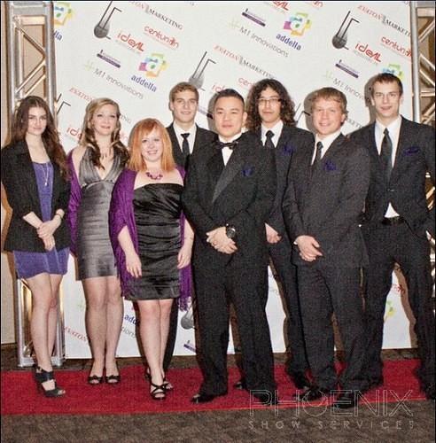 group in front of truss